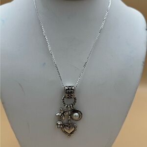 Artisan Silver Charm Necklace with Heart and Pearl Accents. 82